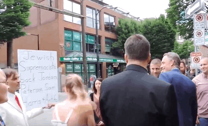 Jordan Peterson Confronted With “Jewish Supremacist” Sign